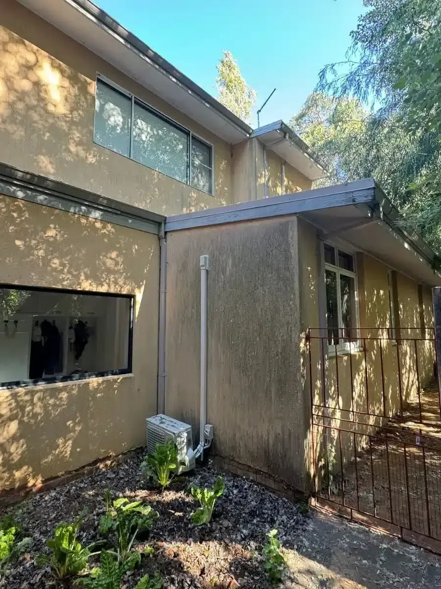 Rendered house exterior before cleaning