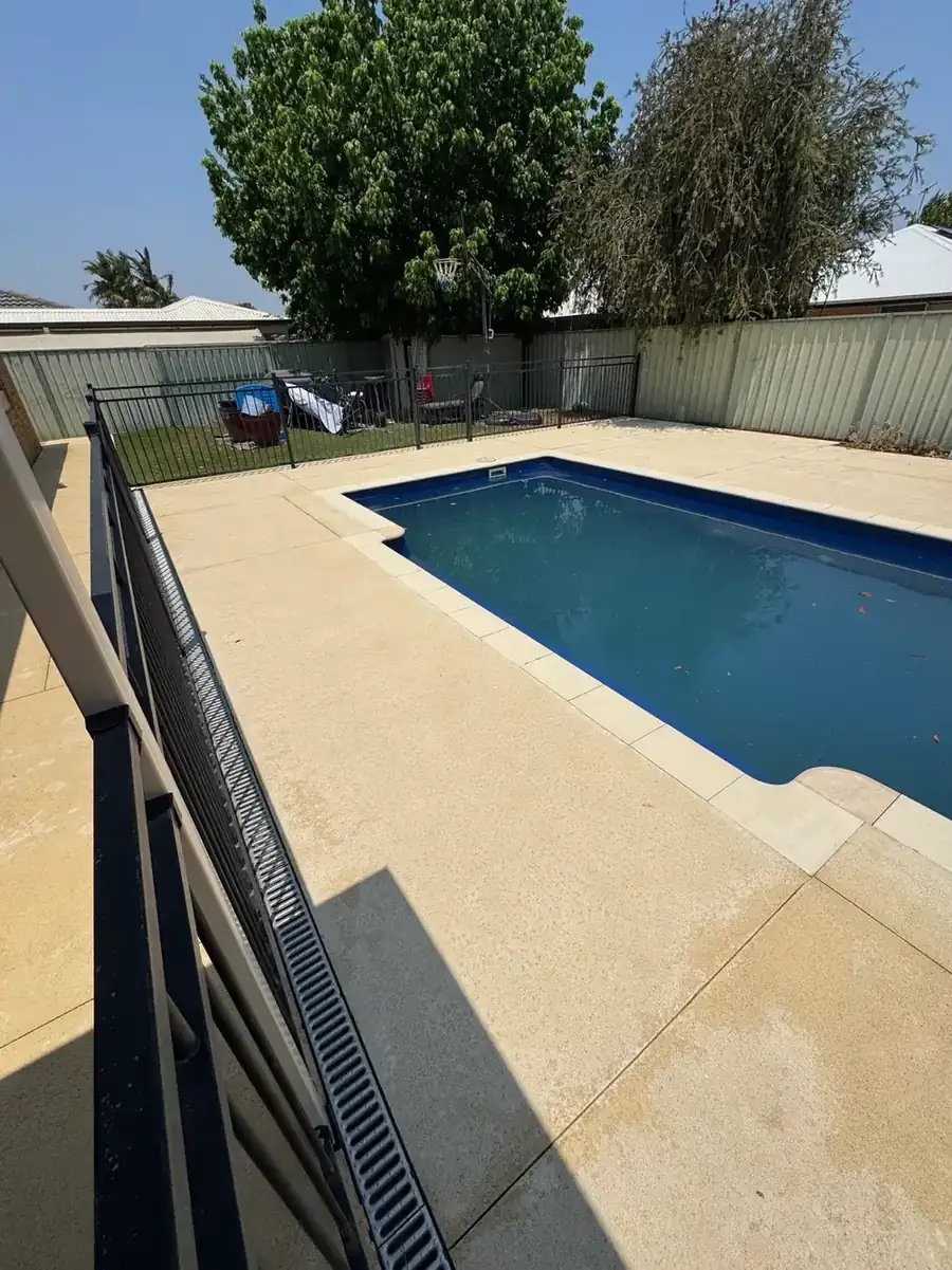Limestone pool surround after cleaning in Perth