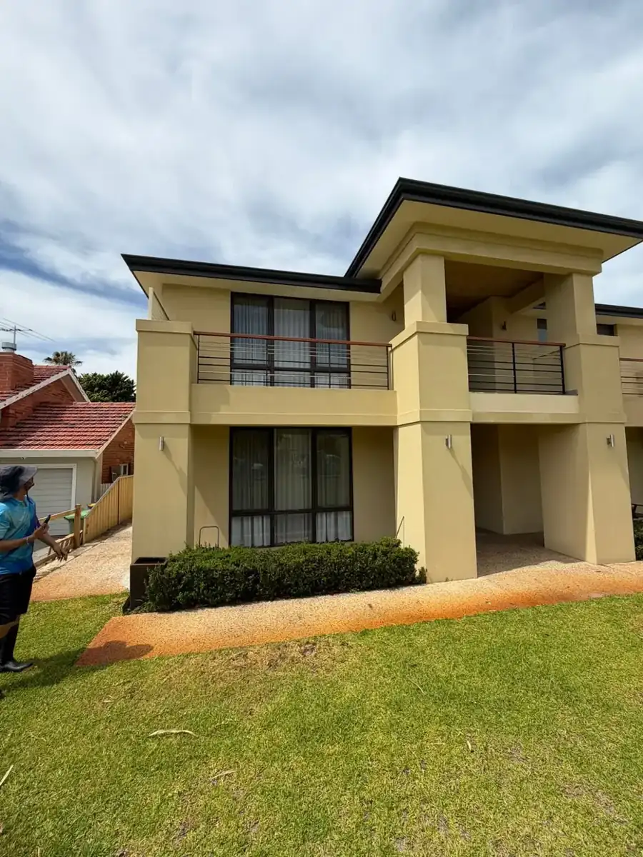 Rendered house exterior after a soft wash in Perth