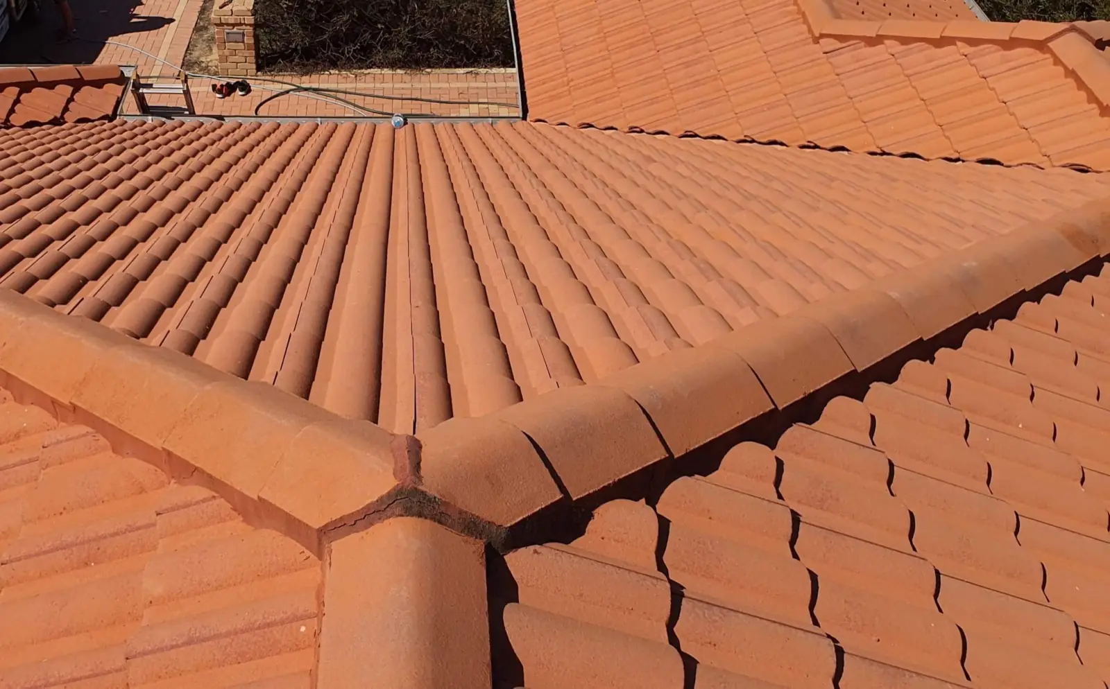 Clean tile roof after an Extera soft-wash treatment
