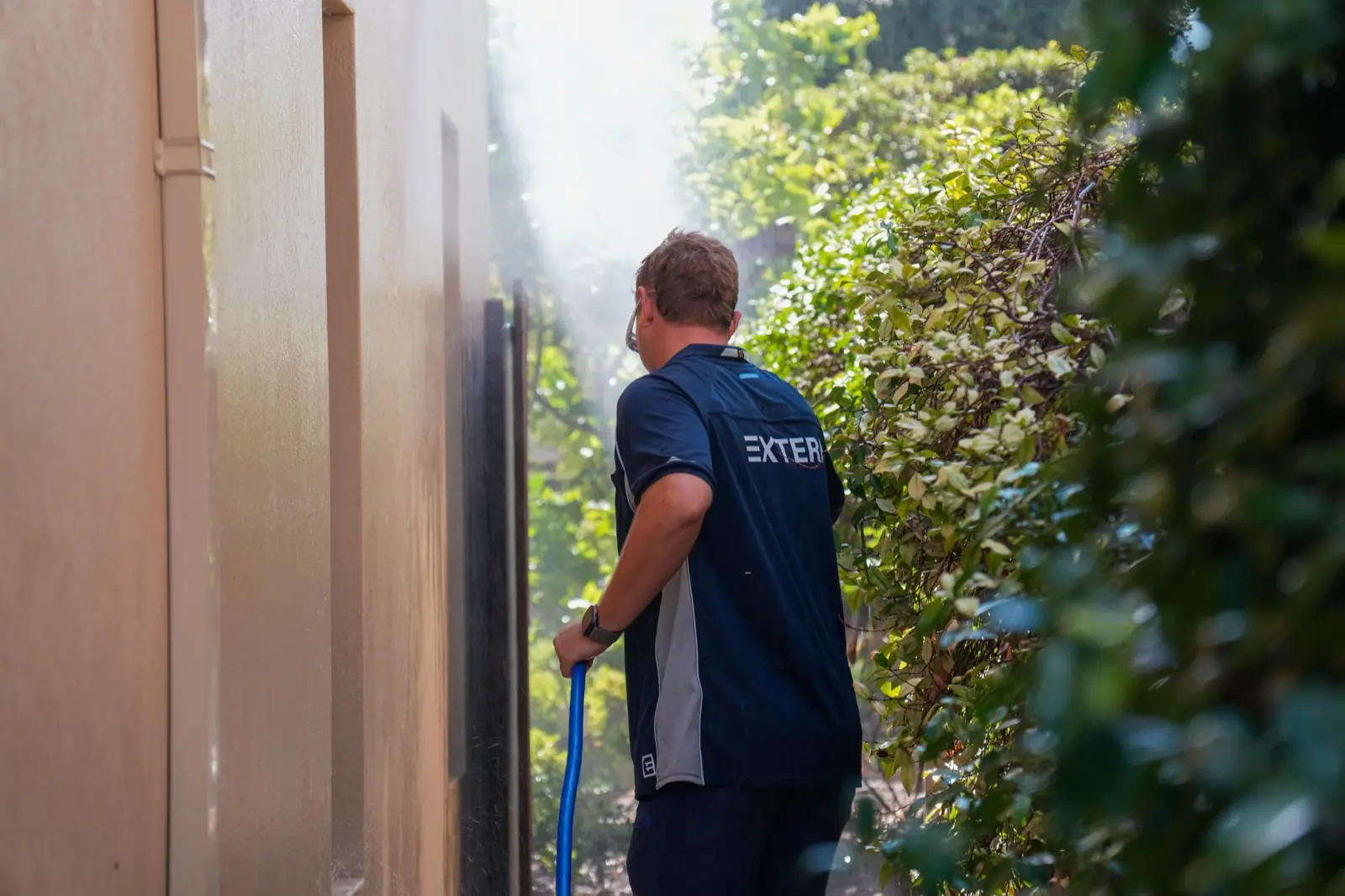 Low-pressure soft washing of render in Perth